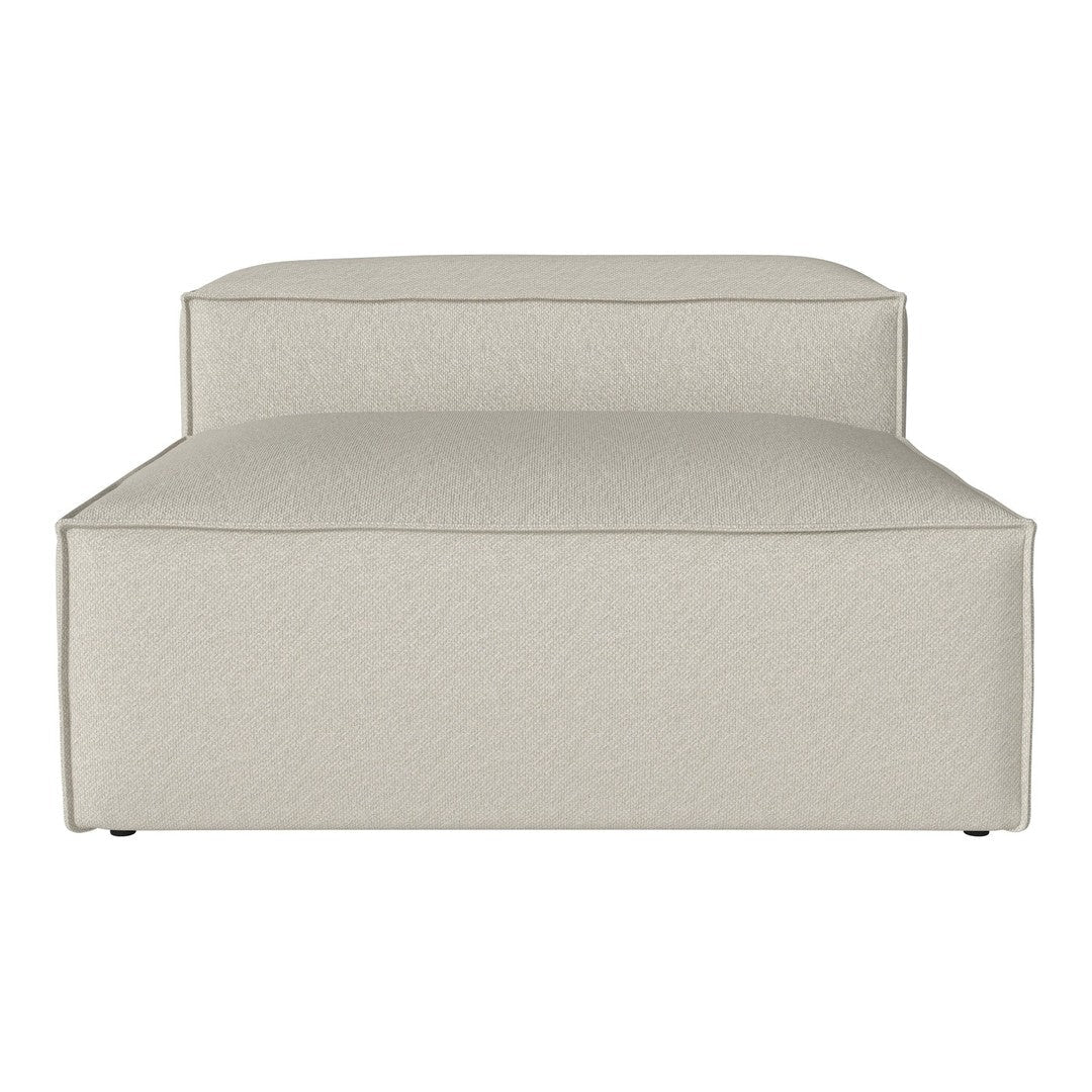 Light beige modular sofa with a minimalist design and soft, textured fabric pattern. Perfect for contemporary decor.