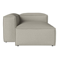 Light gray modular couch with a smooth, minimalist design and subtle texture. Ideal for modern living spaces.