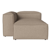 Beige sectional sofa with a textured, minimalist design, perfect for modern living spaces.