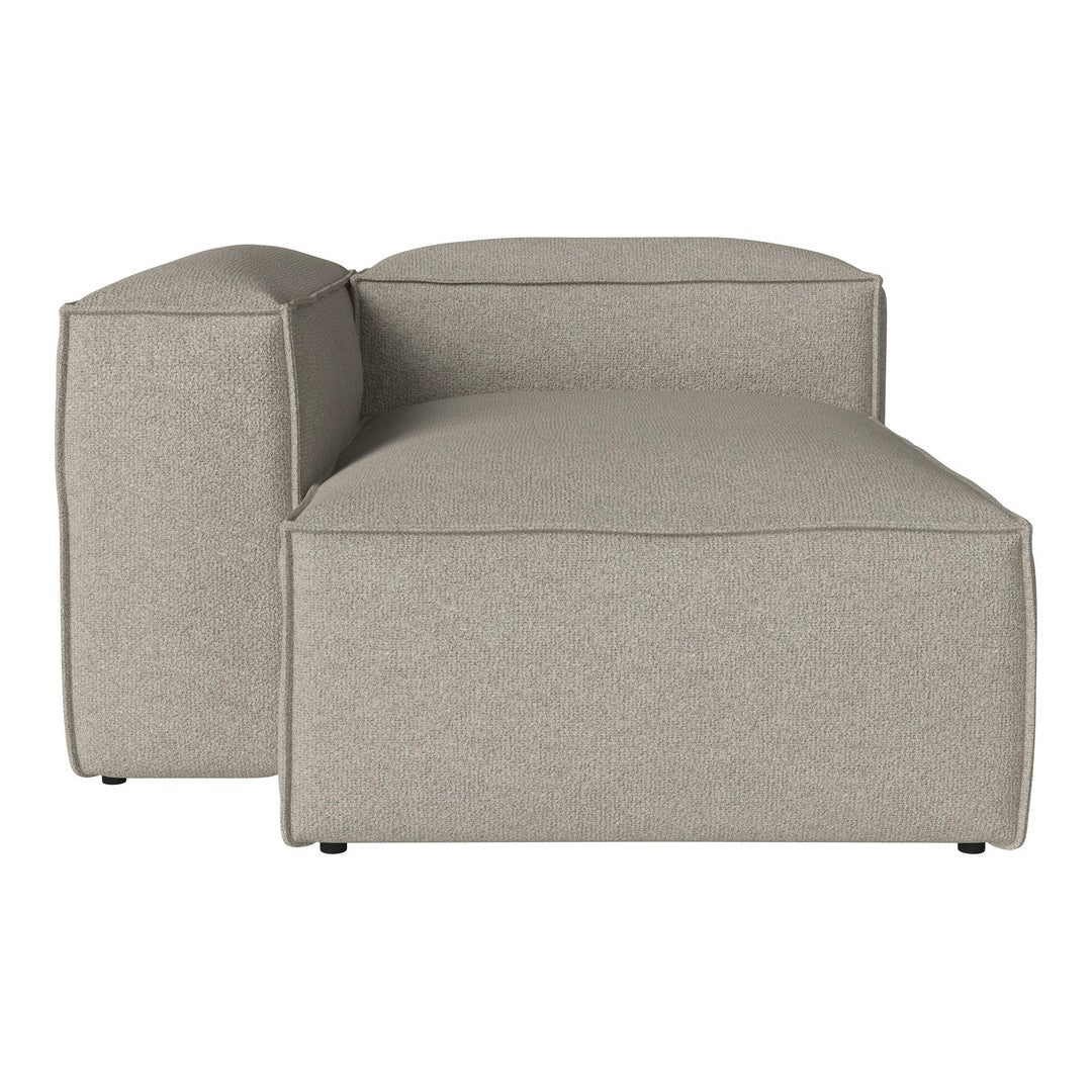 Light grey chaise lounge with a smooth, textured fabric and clean, modern lines. Perfect for contemporary decor.