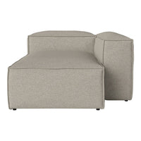 Light gray modular couch with a textured fabric and clean, minimalist design, featuring soft, rounded edges.