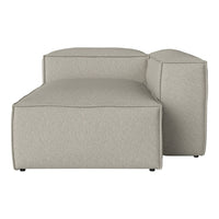 Beige textured fabric chaise lounge with clean lines and minimalistic design, perfect for modern interiors.
