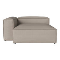 Beige sectional sofa with textured, ribbed fabric and a contemporary design. Perfect for modern living spaces.