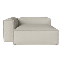Light beige sectional sofa with a textured fabric, featuring a minimalist design and clean lines.