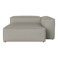 Light gray upholstered sectional sofa with a smooth, minimalist design. Ideal for modern home décor.