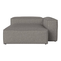 Gray upholstered sectional sofa with minimalist design and clean lines. Perfect for modern living spaces.