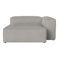 Light gray modular sofa with clean lines and a minimalistic design. Ideal for modern living spaces.