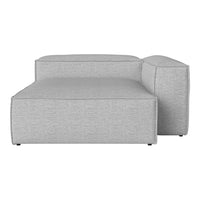 Gray upholstered sectional sofa with a sleek, minimalist design and no visible patterns. Ideal for modern interiors.