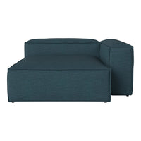 Teal upholstered sectional sofa in a smooth, textured fabric with a modern design. Perfect for contemporary decor.