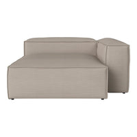 Light beige sectional sofa with a subtle ribbed pattern, featuring a modern and minimalistic design.