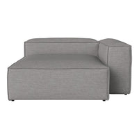 Grey modular sofa with a sleek, minimalist design and subtle textured fabric pattern. Perfect for modern interiors.