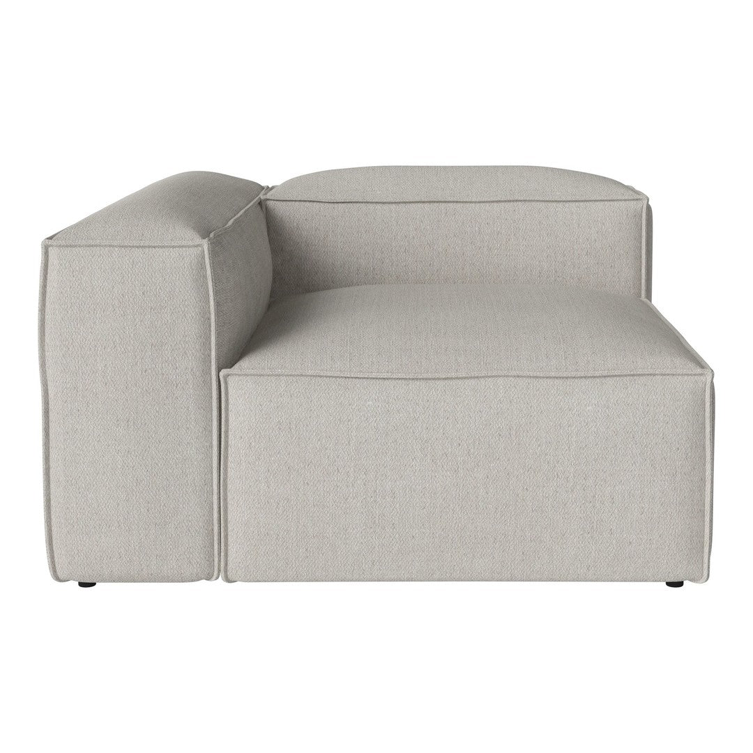 Grey upholstered sectional couch with a smooth, minimalist design and clean lines. Perfect for modern decor.