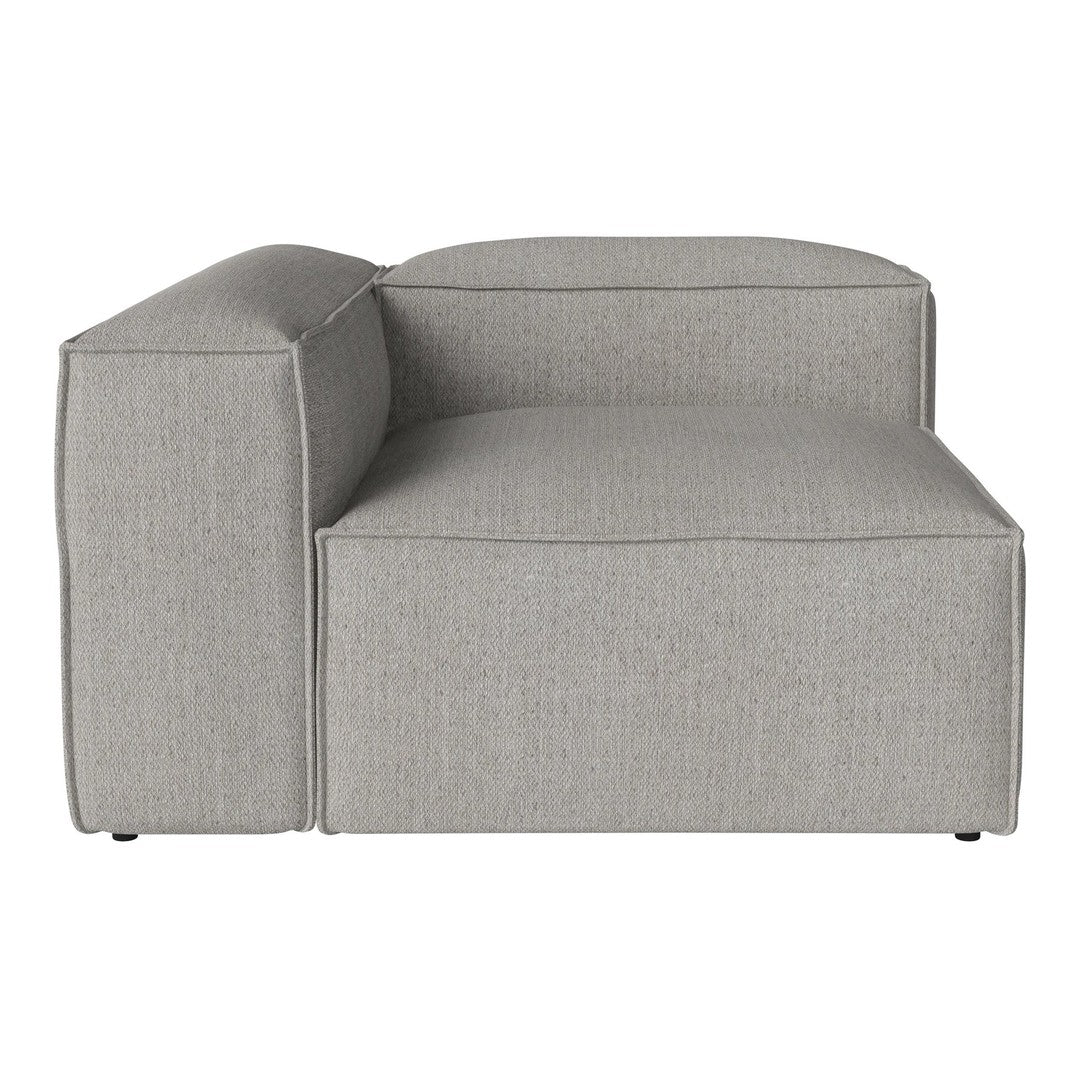 Gray sectional sofa with a sleek, textured fabric and minimalist design, perfect for modern interiors.