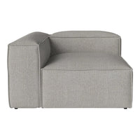 Gray sectional sofa with a sleek, textured fabric and minimalist design, perfect for modern interiors.