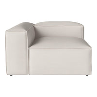 Light beige sectional sofa with minimalist design and smooth, solid surface. Ideal for modern decor.