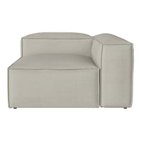 Light gray modular sofa with a minimalist design and smooth fabric texture. Ideal for modern interiors.