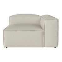 Neutral beige sectional sofa with a subtle textured pattern, featuring clean lines and a modern design.