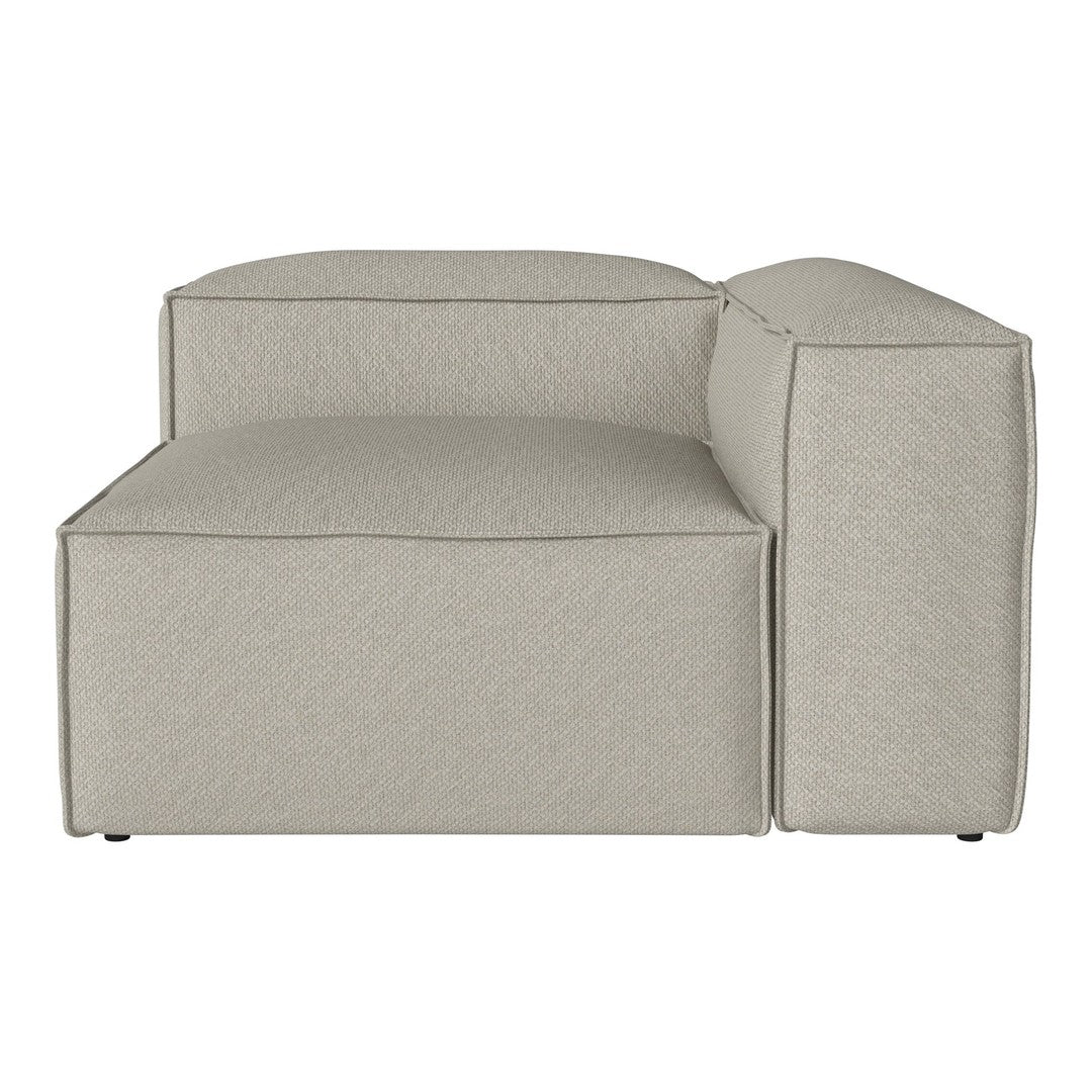 "Light beige modular sofa section with subtle textured pattern, featuring clean lines and a contemporary design."