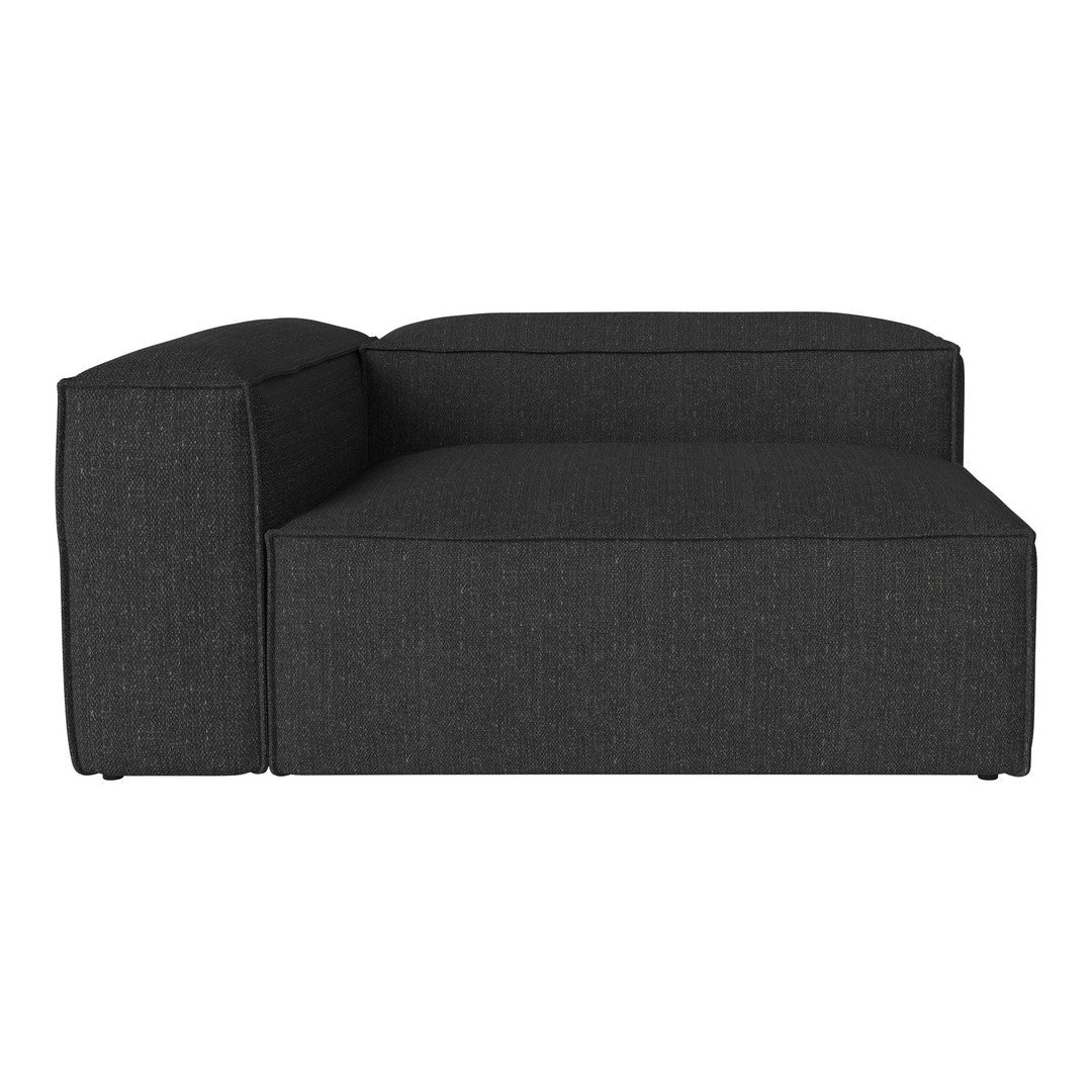 Modern dark gray chaise lounge with a textured fabric pattern, featuring clean lines and a minimalist design.