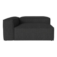 Modern dark gray chaise lounge with a textured fabric pattern, featuring clean lines and a minimalist design.
