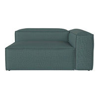 Teal sectional sofa with a textured weave pattern, featuring clean lines and a modern design. Perfect for stylish spaces.