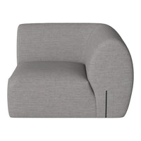Curved gray sofa with a textured fabric pattern, offering a modern and minimalist aesthetic.