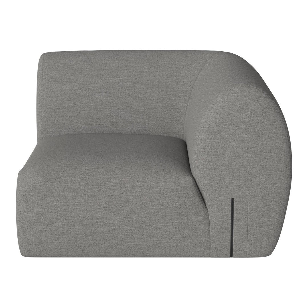 "Contemporary gray upholstered armchair with smooth, minimalist design and subtle texture."