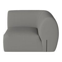 "Contemporary gray upholstered armchair with smooth, minimalist design and subtle texture."