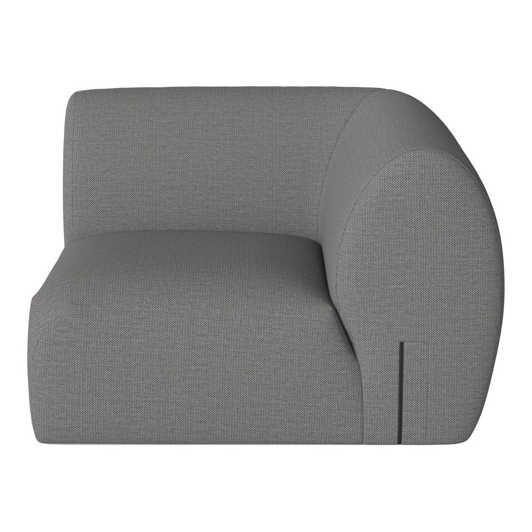 Gray curved armchair with textured fabric, featuring a modern and minimalist design. Perfect for contemporary decor.