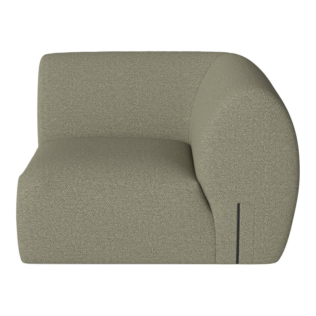 Sleek, curved sofa in soft olive green with a textured fabric and subtle pattern for modern interiors.