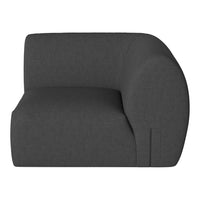 Gray curved sofa with a modern, minimalist design and soft textured fabric. Ideal for contemporary interiors.