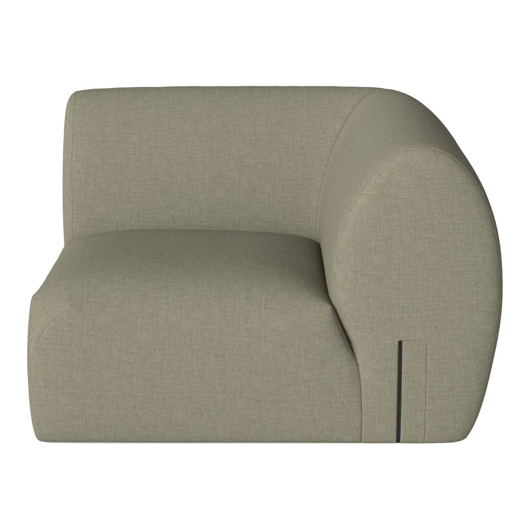 Curved, modern sofa in soft beige fabric with a textured finish and subtle seam details for added style.