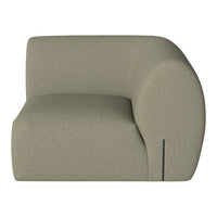 Curved, modern sofa in soft beige fabric with a textured finish and subtle seam details for added style.