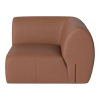 Brown leather sofa with smooth, rounded edges and minimalistic design for modern decor.