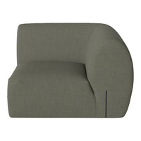 Curved olive green sofa with a smooth texture and minimalistic design, featuring subtle stitching details.
