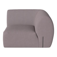Curved accent chair in soft light gray fabric with a smooth, minimalist design. Perfect for modern interiors.