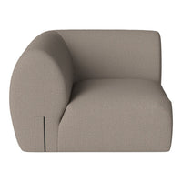 Beige curved sofa with a textured fabric, featuring a minimalist design and smooth lines for a modern aesthetic.