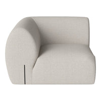 Light beige modular sofa with a smooth, textured fabric and rounded, contemporary design.