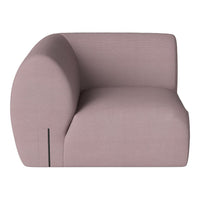 Light pink modern sofa with smooth curves and subtle textured pattern. Ideal for contemporary interior decor.