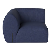 Navy blue curved armchair with subtle textured pattern, perfect for modern decor.
