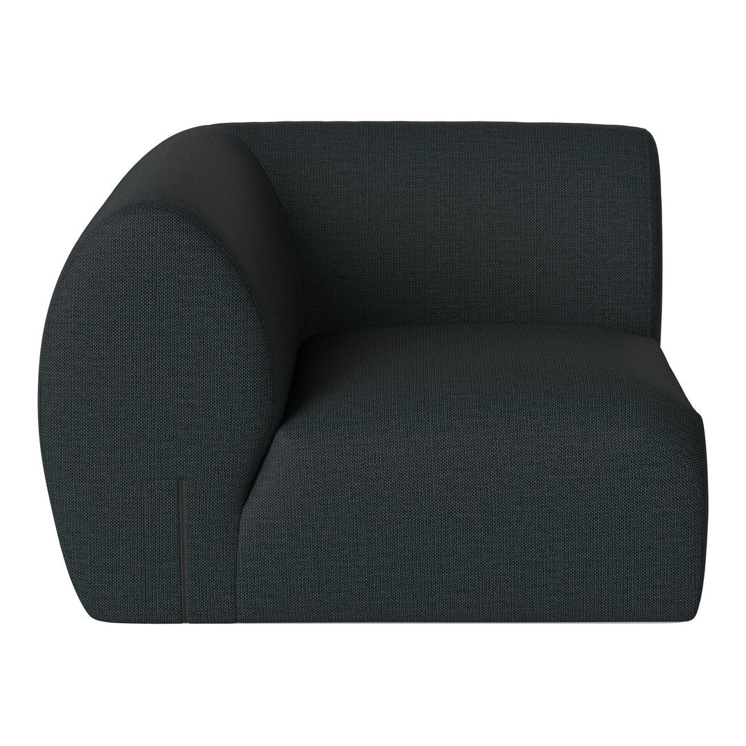 Dark teal upholstered accent chair with a unique curved shape and subtle geometric pattern. Modern and stylish design.
