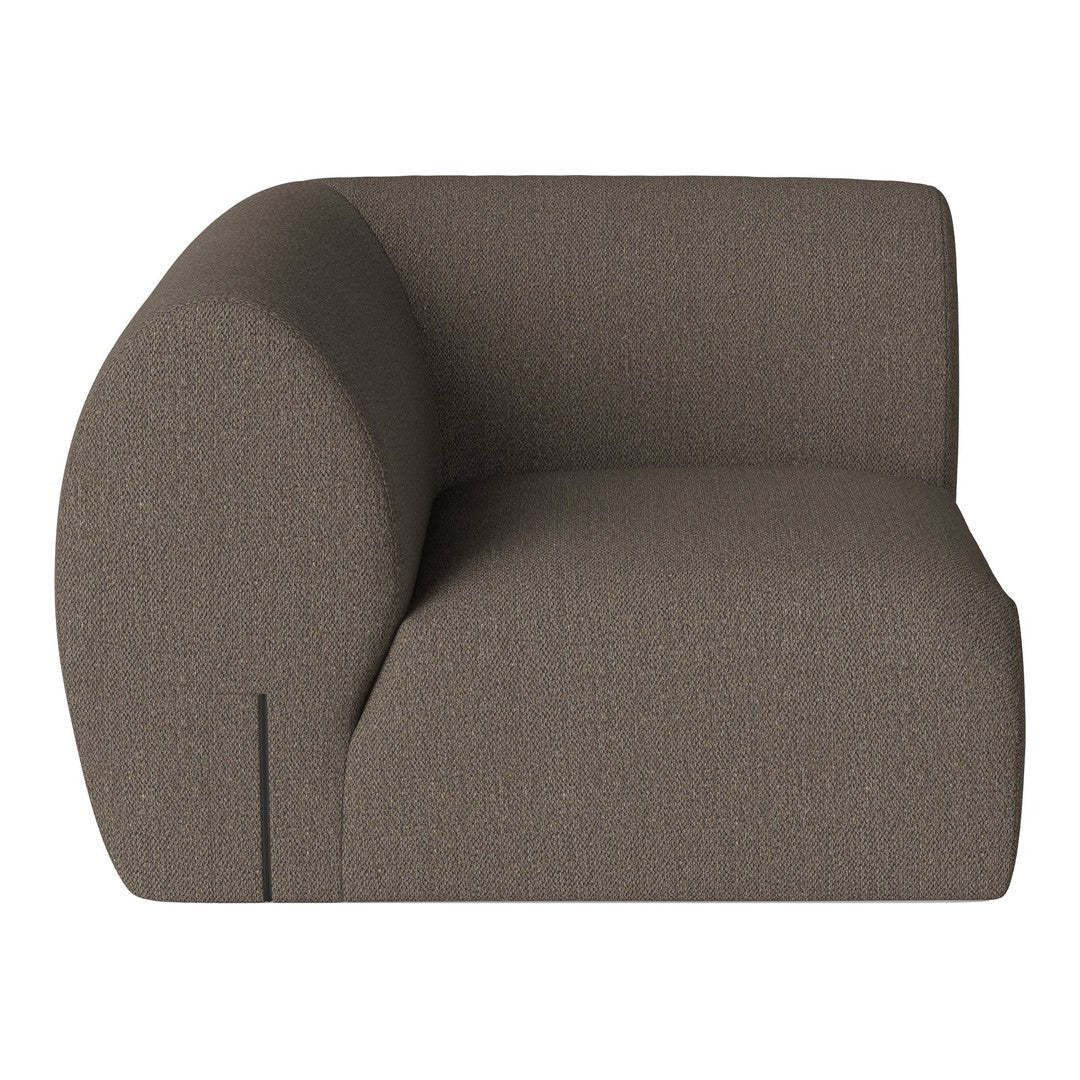 Brown textured armchair with a smooth, rounded silhouette and subtle stitching detail. Perfect for modern decor.