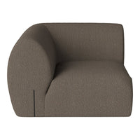 Brown textured armchair with a smooth, rounded silhouette and subtle stitching detail. Perfect for modern decor.