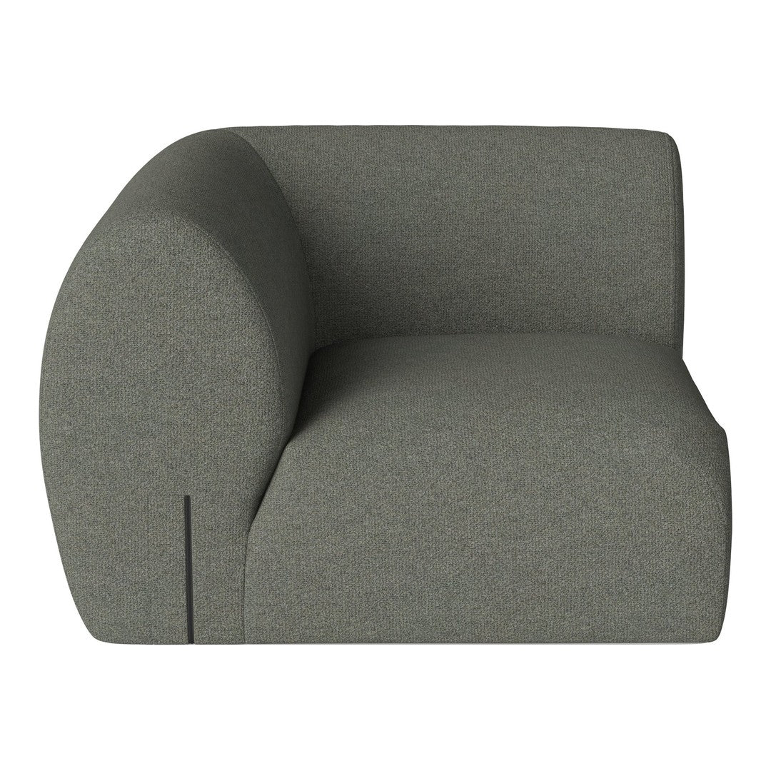 Modern gray upholstered sofa with curved design and subtle texture, adding elegance to any space.