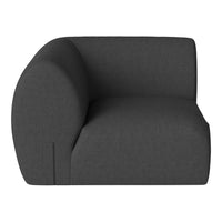 Dark grey upholstered armchair with a minimalist curved design and smooth fabric texture. Perfect for modern decor.