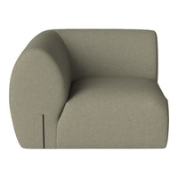 Soft olive green upholstered sofa with a rounded back and clean lines, featuring a textured fabric pattern.