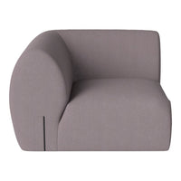 Soft grey armchair with rounded edges and a sleek, minimalist design, perfect for modern interiors.