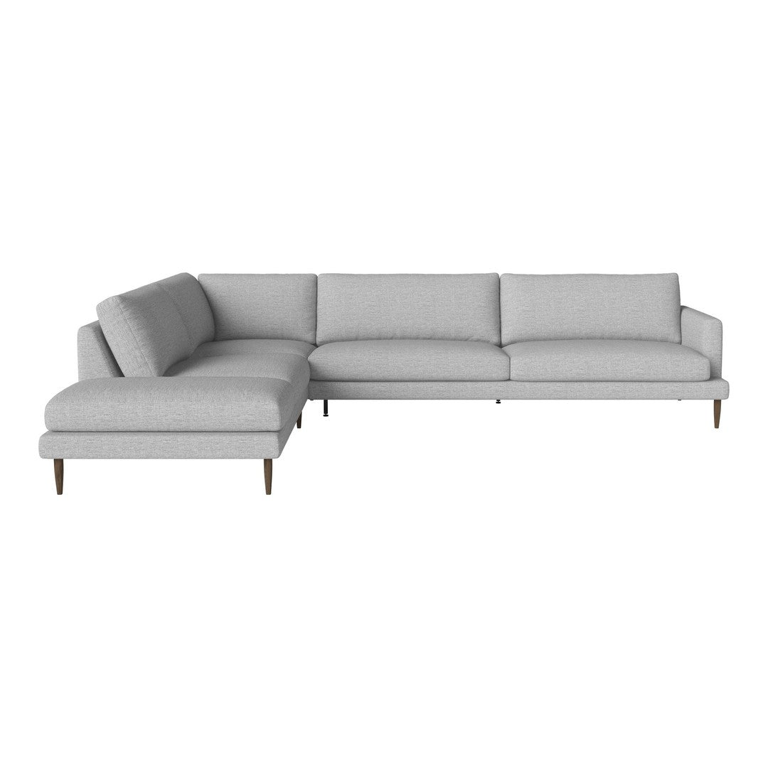 Light gray fabric sectional sofa with a minimalist design and sleek wooden legs. Perfect for modern living spaces.