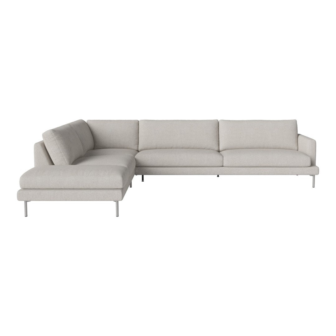 Light grey sectional sofa with soft fabric and minimalist design. Clean lines, no visible patterns. Perfect for modern decor.