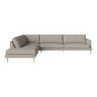Light gray sectional sofa with a modern design and smooth texture, featuring subtle patterns and wooden legs.